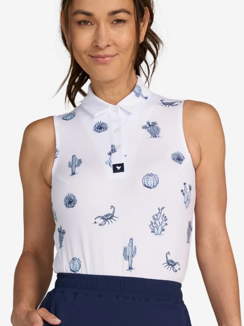 Bad Birdie Women’s Sleeveless White Golf Polo Top with Navy Desert Print Cactus